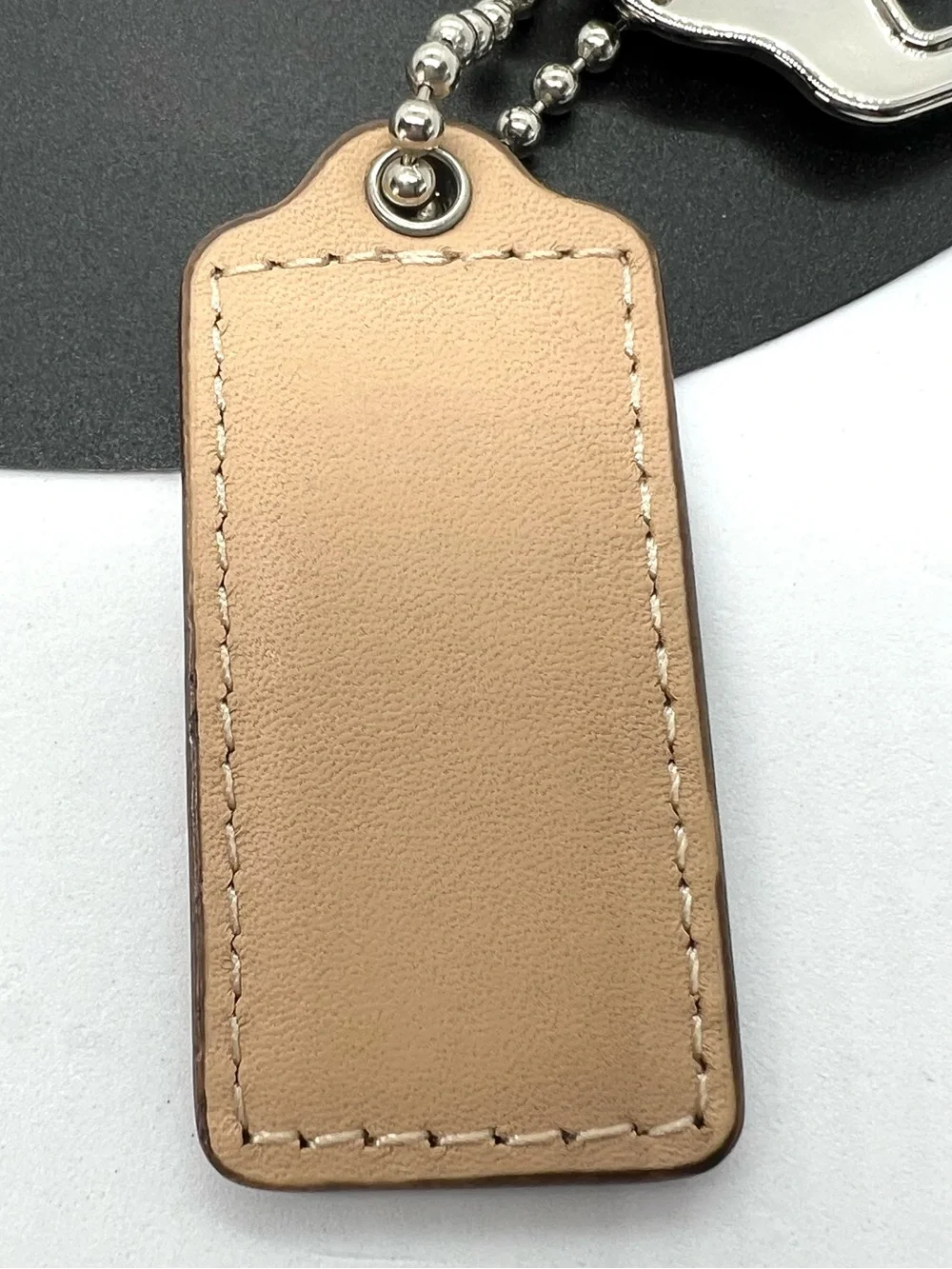 COACH Beige Leather Silver Logo 3 Piece Bag Charm Keychain Hang Tag Set
